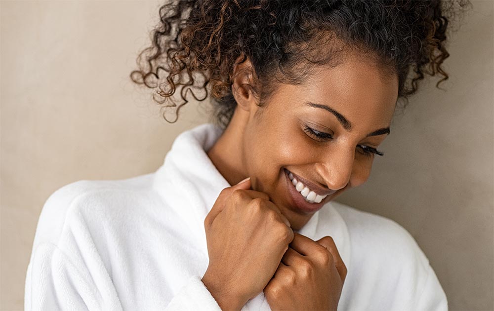 Woman enjoying her soft robe