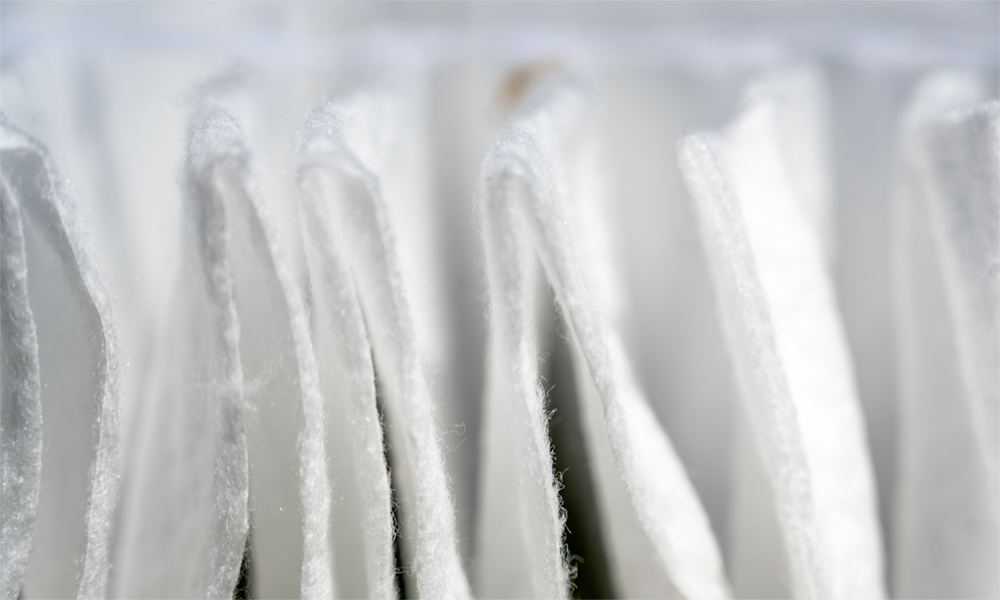 Non-woven silicone finishes showing a white cloth