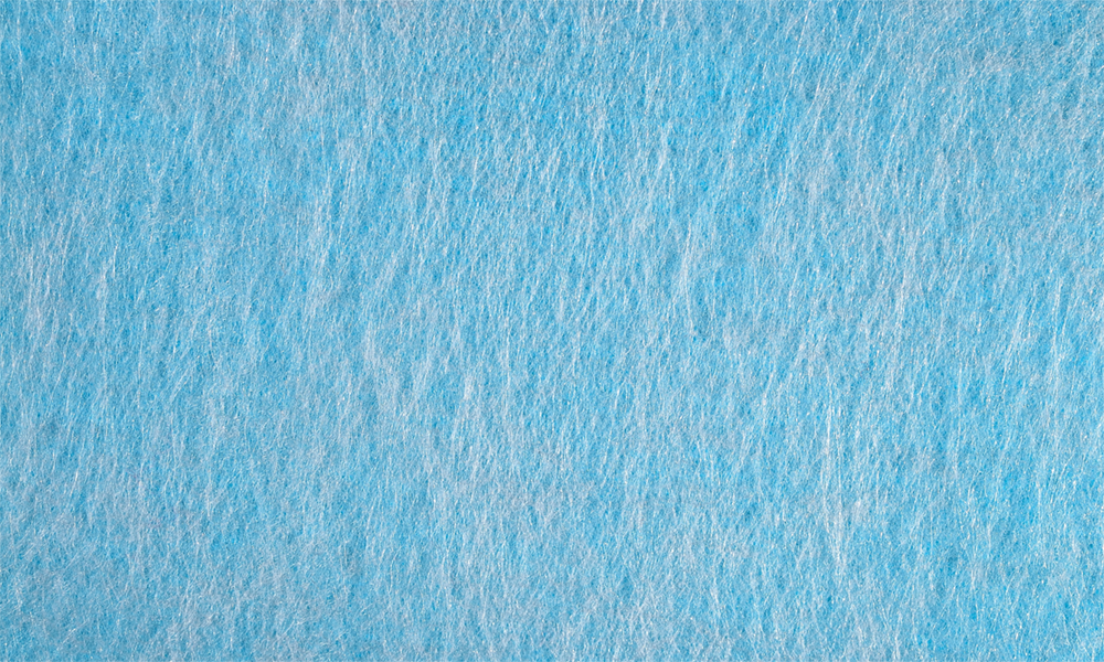 Non-woven additives for a premium silicone softener blue fabric 