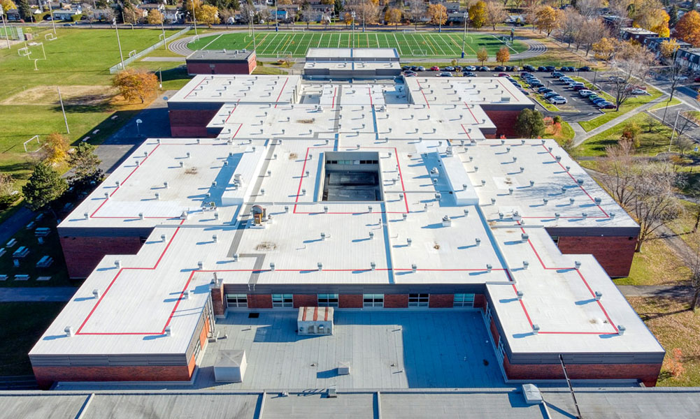 Polybel School in Canada with a roof protected using Enduris silicone roof coating.