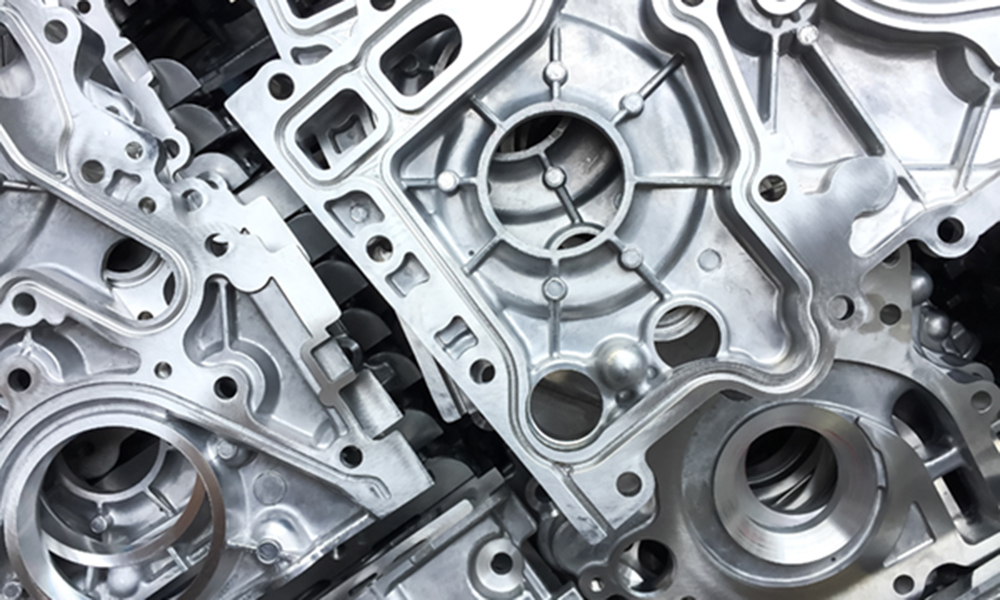 Close-up of aluminum die-cast components, representing Momentive’s silicone-based mold release agents for efficient metal casting under extreme heat and pressure.