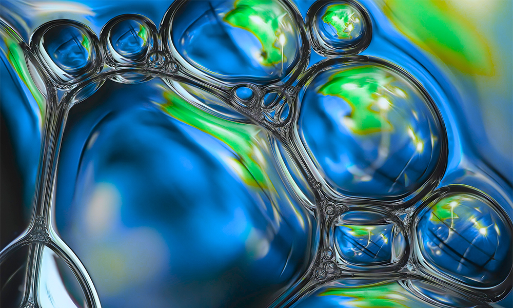 Close-up of slabstock silicone surfactant bubbles illustrating advanced polyurethane foam solutions for sustainability and comfort.